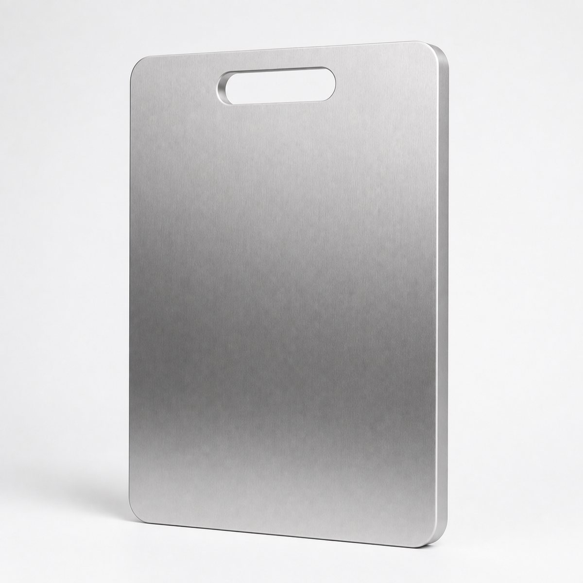 The stainless steel cutting board on a white background